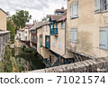 Cuissance River in the historical village of Arbois, Jura, France 71021574