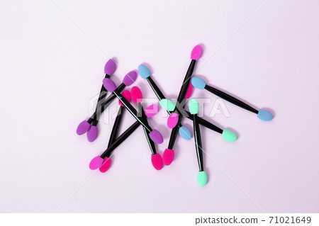 Professional makeup brush on colorful background 71021649