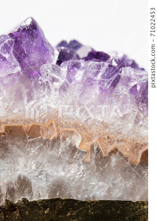 Real macro photo of amethyst natural crystal. Side view. 71022453