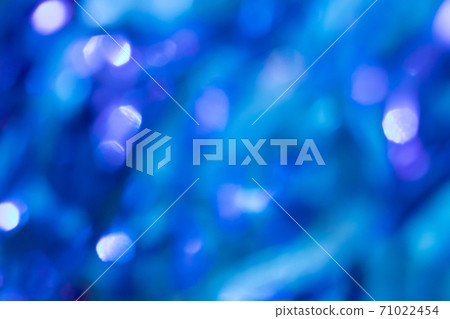 Abstract blurred blue background with beautiful bokeh effect. Abstract blurred blue background with beautiful bokeh effect. 71022454