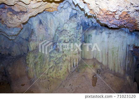 Indian Cave in Vinales, Cuba. Underground cave with stalactites and stalagmites, and river.. 71023120