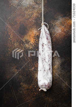 Longaniza wurst on dark background, flat lay with copy space 71024030