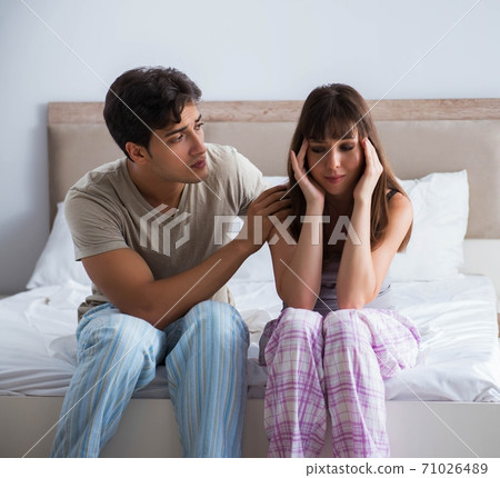 Woman and man in the bedroom Woman and man in the bedroom 71026489
