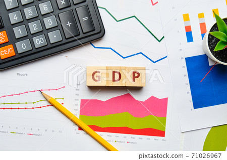 Gross Domestic Product concept with graphs and reports on paper 71026967
