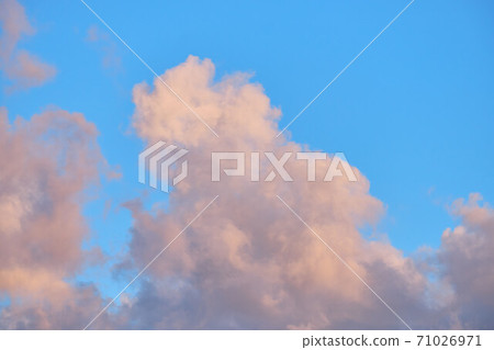 Large air clouds in summer in the evening sky Large air clouds in summer in the evening sky 71026971