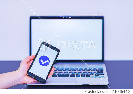 Smartphone authentication verify electronic approval [image of digitization of authentication] 71036440