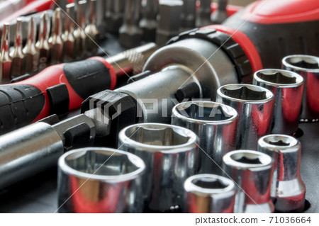 a set of metal heads with bit of key and screwdriver inside tool box. 71036664