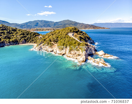 Drone aerial view of sea and rocks in Olympiada, Halkidiki, Greece Drone aerial view of sea and rocks in Olympiada, Halkidiki, Greece 71036837