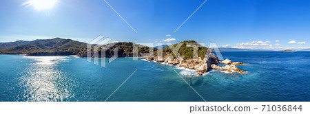 Drone aerial view of sea and rocks in Olympiada, Halkidiki, Greece Drone aerial view of sea and rocks in Olympiada, Halkidiki, Greece 71036844