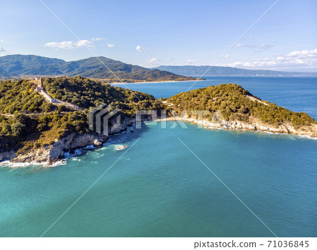 Drone aerial view of sea and rocks in Olympiada, Halkidiki, Gree 71036845