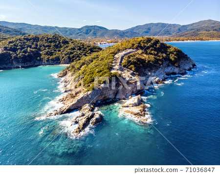 Drone aerial view of sea and rocks in Olympiada, Halkidiki, Gree Drone aerial view of sea and rocks in Olympiada, Halkidiki, Gree 71036847