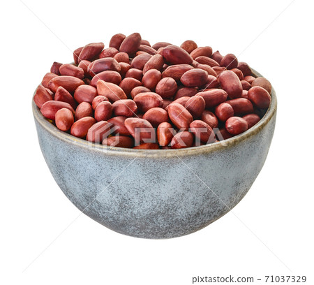 raw peanuts in bowl close-up with clipping path 71037329