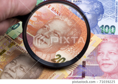 South African rand in a magnifying glass 71039225