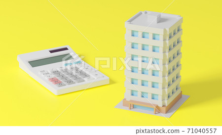 Toy mansion and calculator placed on a flat surface 71040557