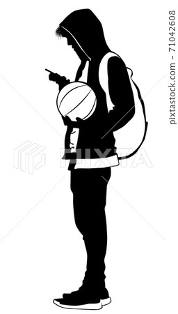 Silhouette of a young man with a ball and a cell phone Silhouette of a young man with a ball and a cell phone 71042608