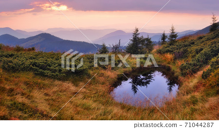 Lake in the mountains Lake in the mountains 71044287