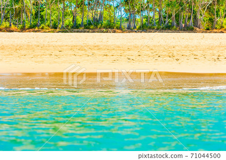 Island sand and blue sea Island sand and blue sea 71044500