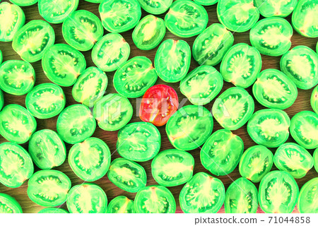 Green sliced tomato with red tomato Green sliced tomato with red tomato 71044858