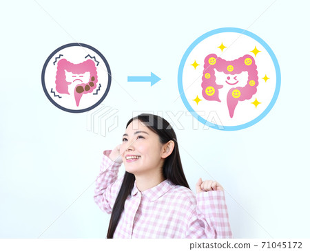 Image of a woman in pajamas with constipation resolved Image of a woman in pajamas with constipation resolved 71045172