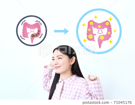 Image of a woman in pajamas with constipation resolved 71045176