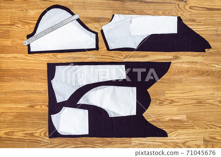top view of layouts of sewing patterns on table top view of layouts of sewing patterns on table 71045676