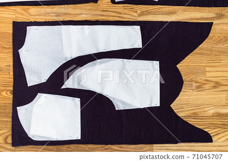 top view of few paper layouts of sewing patterns top view of few paper layouts of sewing patterns 71045707