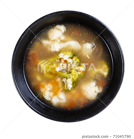 top view of broth with stelline and vegetables 71045790
