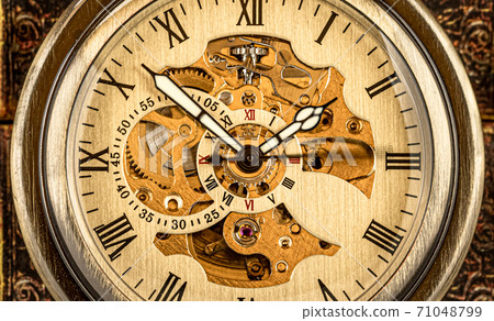 Antique clock dial close-up. Vintage pocket watch. 71048799