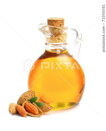 Almonds with almonds nuts isolated on white backgrounds. 71050591