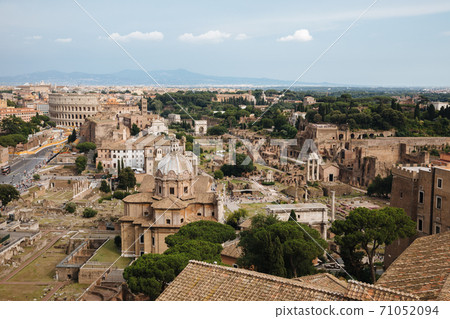Panoramic view of city Rome with Roman forum and Colosseum from Vittoriano 71052094