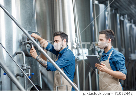 Beer production at factory during covid-19 epidemic 71052442