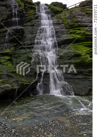 Tintagel Haven beach waterfall - Tintagel, Cornwall, United Kingdom Tintagel Haven beach waterfall - Tintagel, Cornwall, United Kingdom 71059711