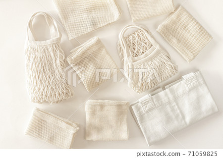 Zero waste minimal composition with tring and canvas bags for storage. Zero waste minimal composition with tring and canvas bags for storage. 71059825