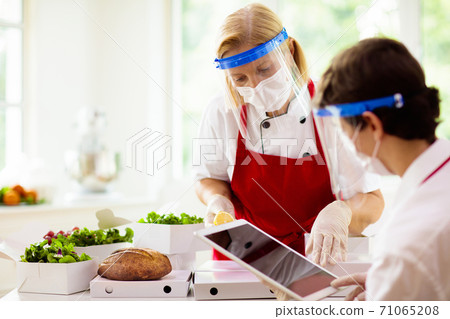 Food takeaway during coronavirus outbreak. Food takeaway during coronavirus outbreak. 71065208