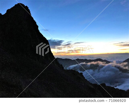 The tip of Mt. Yari and the sunrise The tip of Mt. Yari and the sunrise 71066920
