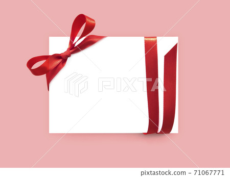 Paper card with red bow ribbon Paper card with red bow ribbon 71067771