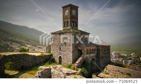 Panoramic view to Gjirokastra castle with the wall, tower and Clock, Gjirokaster, Albania 71069525