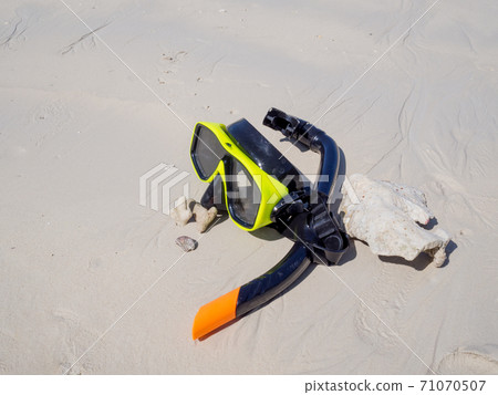 Snorkel on white sand beach background, Enjoy snorkeling Tour on your holidays 71070507
