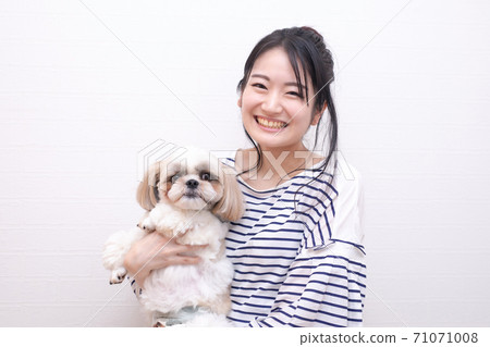 Dog and lady 71071008