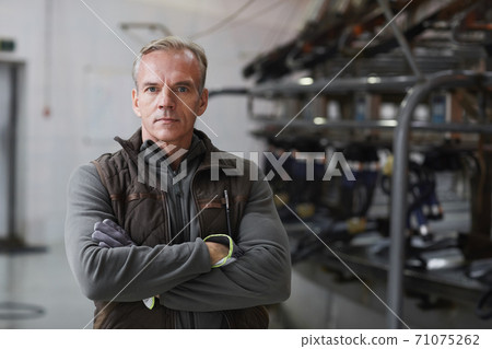 Portrait of Worker at Dairy Farm 71075262