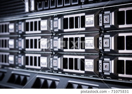 Array of data storage hard drives in internet data center 71075831