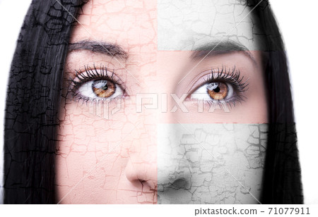 Beautiful insightful look brown woman's eyes 71077911