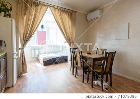 View of the living room together with the kitchen and also combined with the insulated balcony View of the living room together with the kitchen and also combined with the insulated balcony 71079386