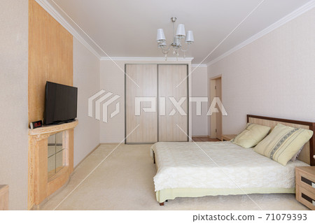 General plan of a spacious, bright, cozy bedroom General plan of a spacious, bright, cozy bedroom 71079393