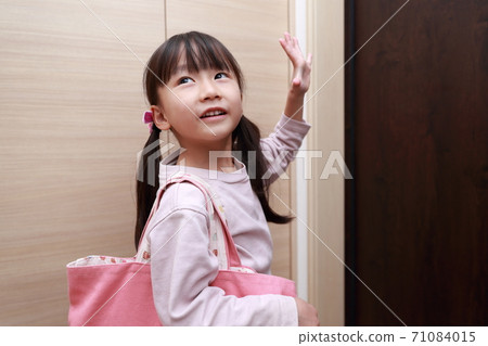 Girl attending lessons 71084015