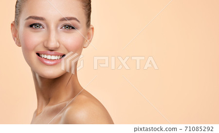 Beautiful face of smiling woman with clean fresh skin Beautiful face of smiling woman with clean fresh skin 71085292