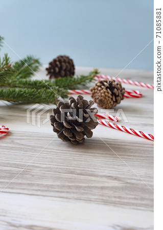 Christmas tree branches and pine cones on the table. Christmas, fir tree, Christmas preparation, etc. Christmas tree branches and pine cones on the table. Christmas, fir tree, Christmas preparation, etc. 71085881
