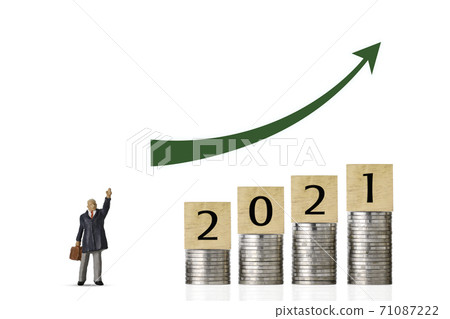 Business investment and growth year 2021stacking coin growing with businessman stand with up arrow Business investment and growth year 2021stacking coin growing with businessman stand with up arrow 71087222