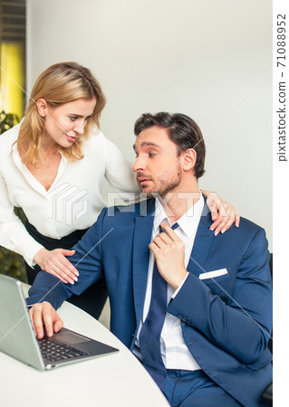 A novel at work. The woman boss molests his subordinate employee. Sexual harassment A novel at work. The woman boss molests his subordinate employee. Sexual harassment 71088952