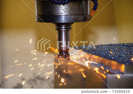 The burning chip from CNC milling machine rough cutting by index-able end-mill tools. The burning chip from CNC milling machine rough cutting by index-able end-mill tools. 71089810